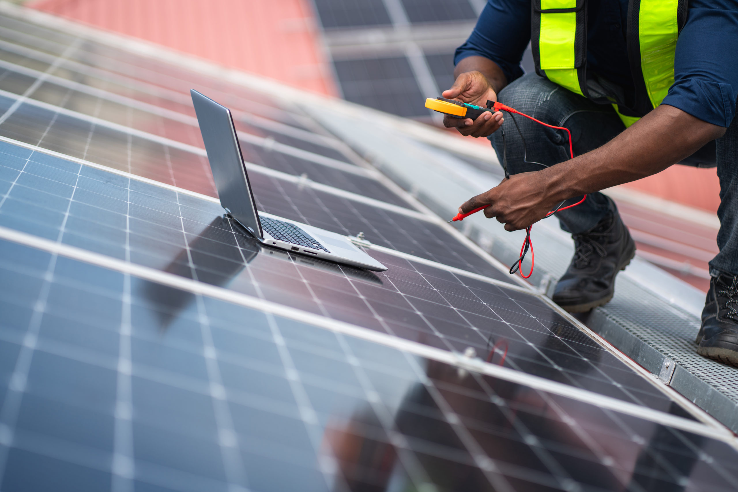 Service engineer checking solar cell on the roof for maintenance if there is a damaged part. Engineer worker install solar panel. Clean energy concept. Service engineer checking solar cell on the roof for maintenance if there is a damaged part. Engineer worker install solar panel. Clean energy concept.