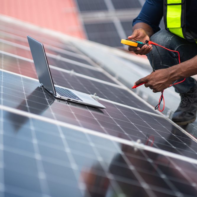 Service engineer checking solar cell on the roof for maintenance if there is a damaged part. Engineer worker install solar panel. Clean energy concept. Service engineer checking solar cell on the roof for maintenance if there is a damaged part. Engineer worker install solar panel. Clean energy concept.
